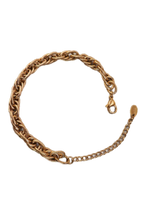 Gold chain bracelet on a white background